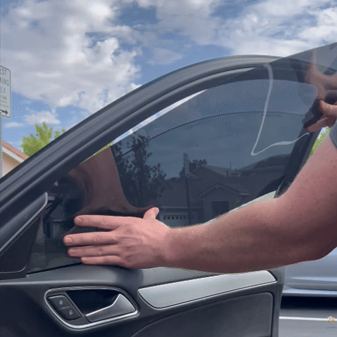 Car Exterior with Tinted Windows:
"Sedan with Evania InstaTints applied on car windows for sleek look"