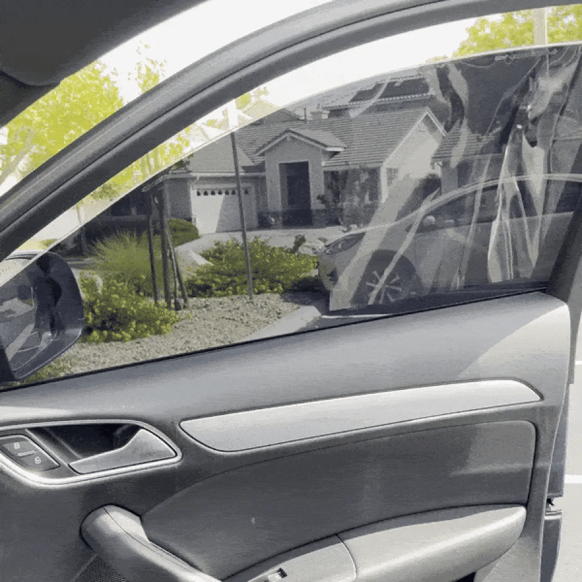 Interior View (from inside car):
"Driver’s view through Evania InstaTints tinted car glass"
