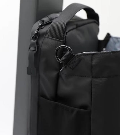 Lifestyle Shot (at the gym):
"Athlete carrying Evania Magnetic Gym Bag to gym locker room"